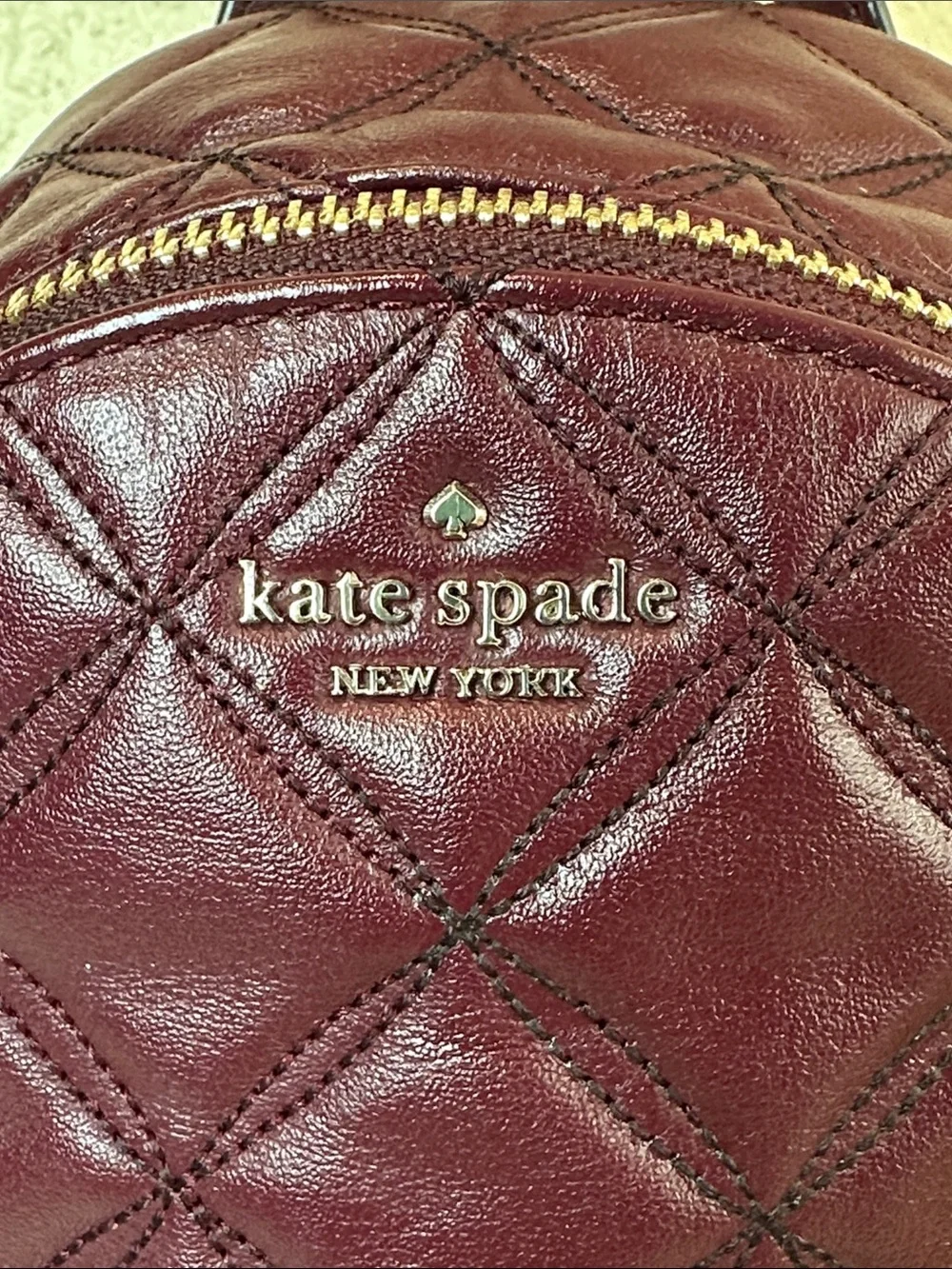 kate spade Quilted Wine Leather Mini Backpack